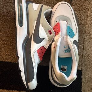 Nike Kids Sneakers - White, Gray, and Red Accents